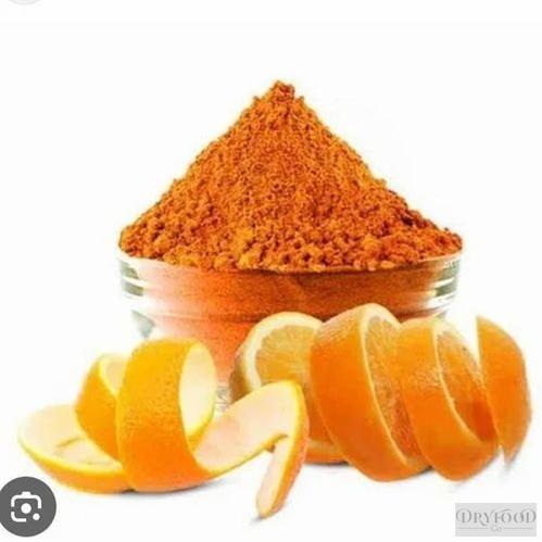 Bright orange peel extract powder showcasing vibrant orange color and fine texture