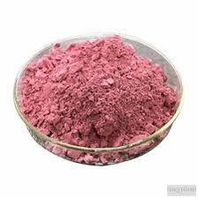 Close-up of vibrant rose petals turned into a smooth, fragrant powder extract